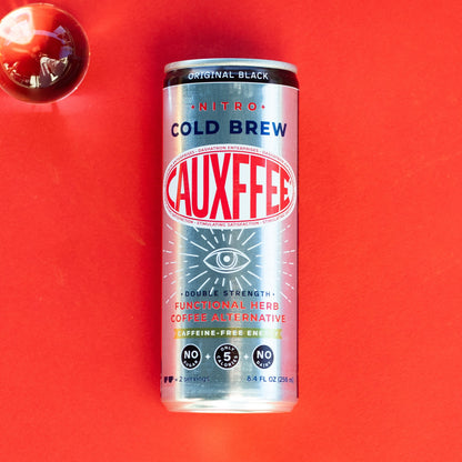 Cauxffee Silver Bullet can on a red background with orb